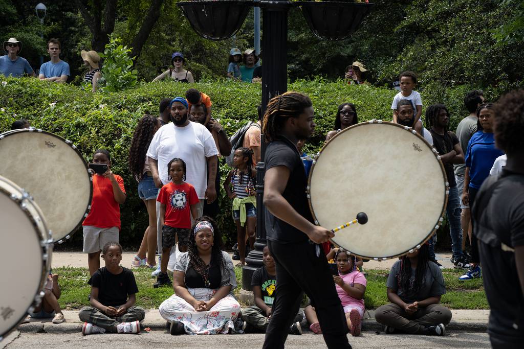 The crowd watches along 53rd Street for the 4th on 53rd Parade in the Hyde Park neighborhood on July 4, 2023.