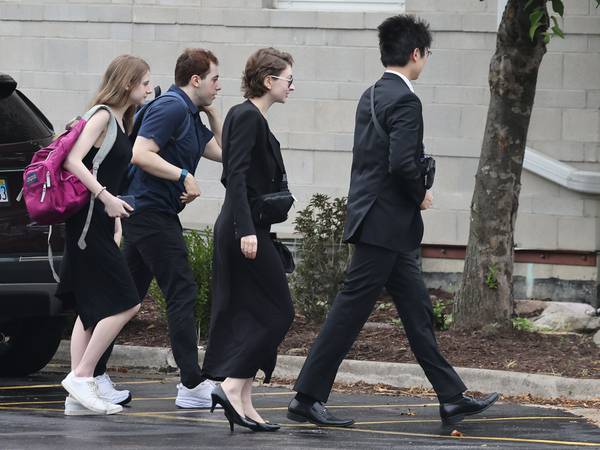 People arrive at Living Water Evangelical Church in Naperville Saturday for the funeral of Eva Liu, a 21-year-old Naperville woman died June 15 after being attacked near Neuschwanstein Castle in Bavaria, Germany, while on vacation.