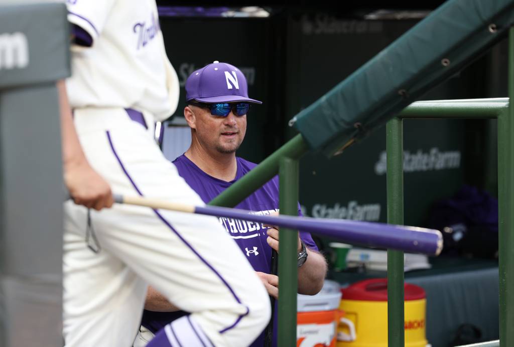 Northwestern University head coach Jim Foster in the dugout before a game against the University of Notre Dame at Wrigley Field May 16, 2023. Foster faces allegations of bullying and abusive behavior, complaints that recently ignited a human resources investigation.