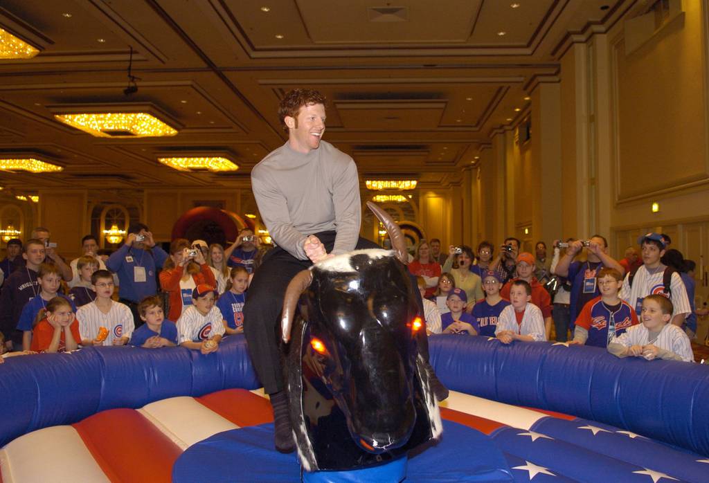 To the delight of fans, outfielder Matt Murton rides an electronic bull at the 2006 Cubs Convention at the Hilton Towers.