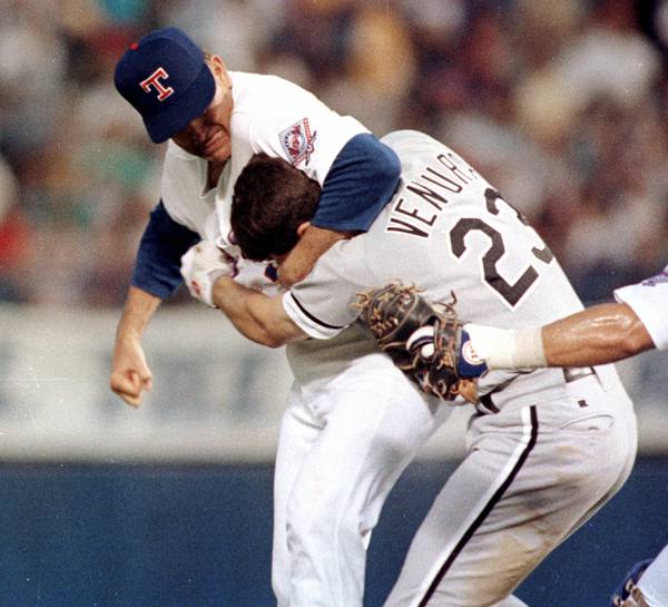Rangers pitcher Nolan Ryan hits the White Sox's Robin Ventura after Ventura charged the mound, in Arlington, Texas, on Aug. 4, 2018.