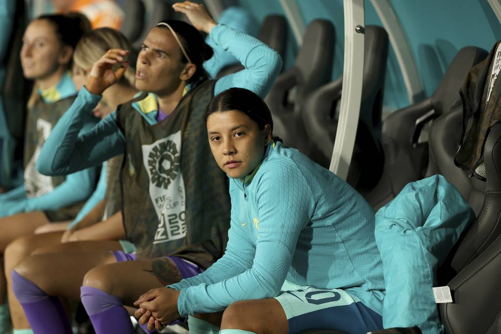 Australia's Sam Kerr walks sits on the bench before a World Cup match against Canada on July 31, 2023.