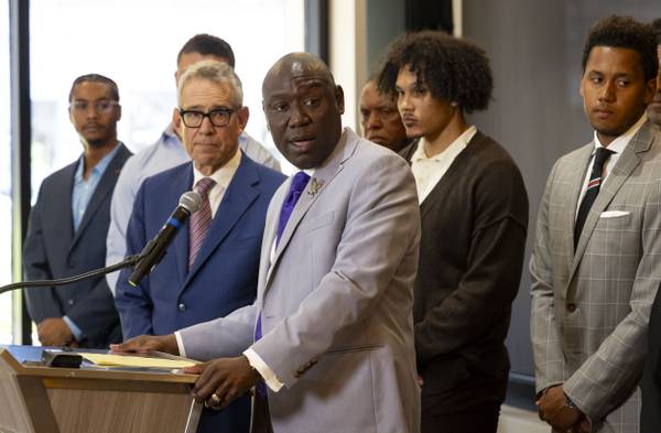 Attorneys Ben Crump and Steven Levin speak on July 19, 2023, alongside former Northwestern football players about the abuse and hazing they say occurred in the program.