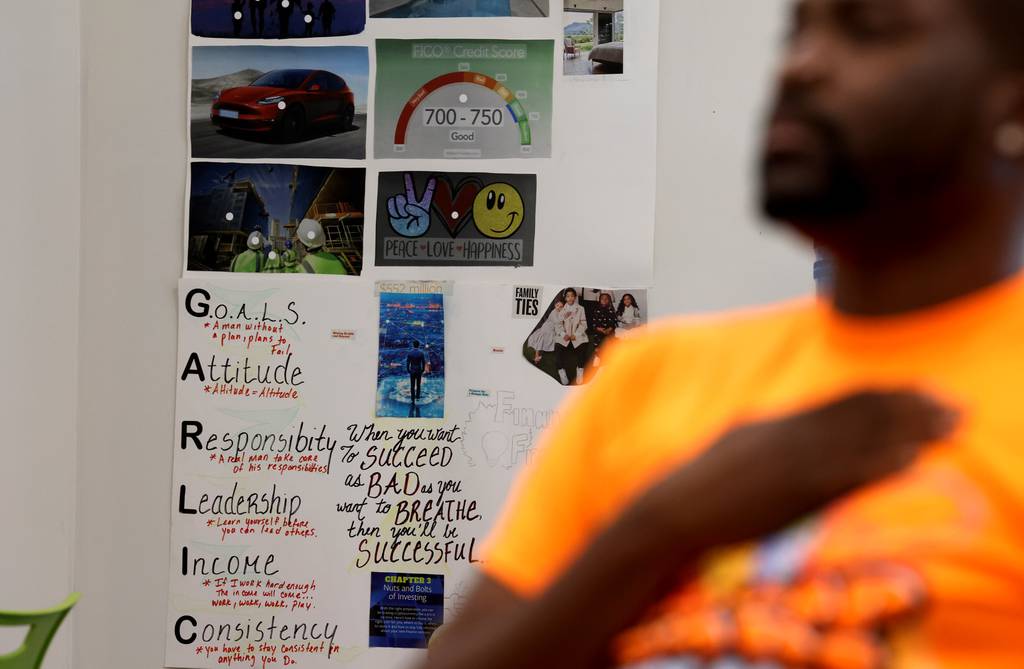 Peace circle leader Fred Cooper talks with community members in Chicago’s Englewood neighborhood, July 20, 2023.