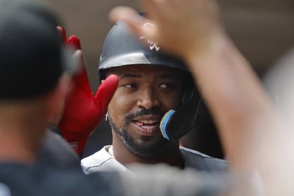 Chicago White Sox's Eloy Jimenez celebrates his solo home run against the Minnesota Twins in the second inning on July 23, 2023.