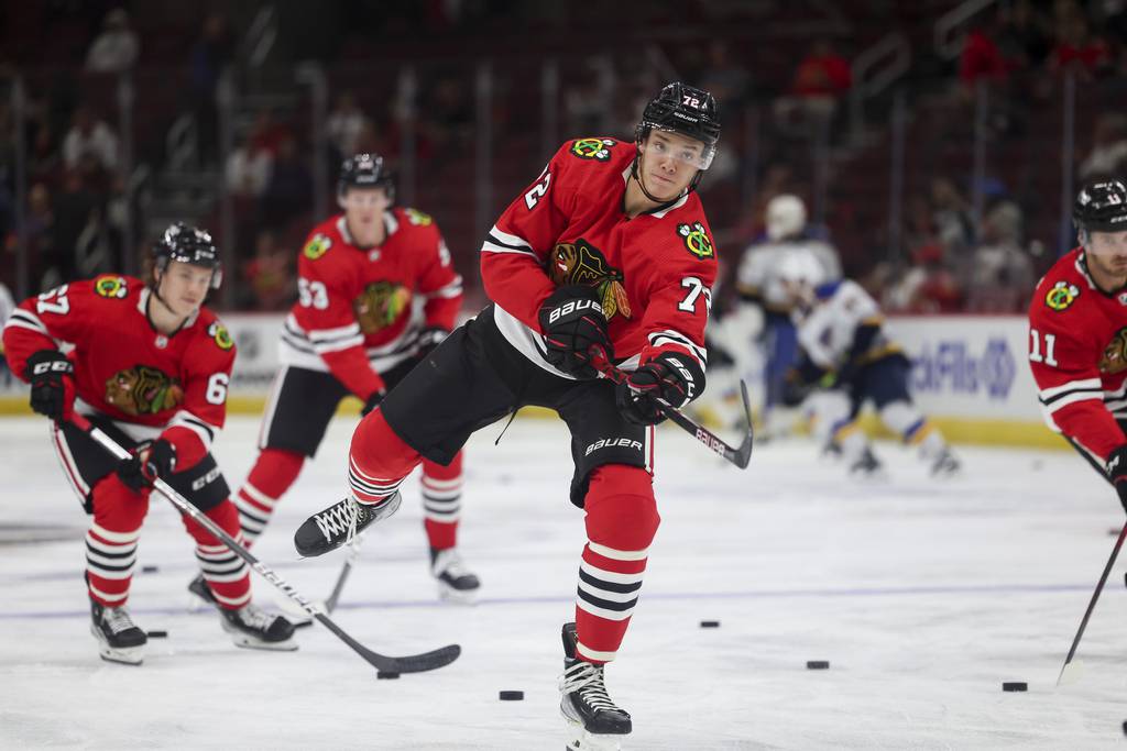 Blackhawks defenseman Alex Vlasic (72) warms up before a game against the Blues on Sept. 27, 2022, at the United Center.