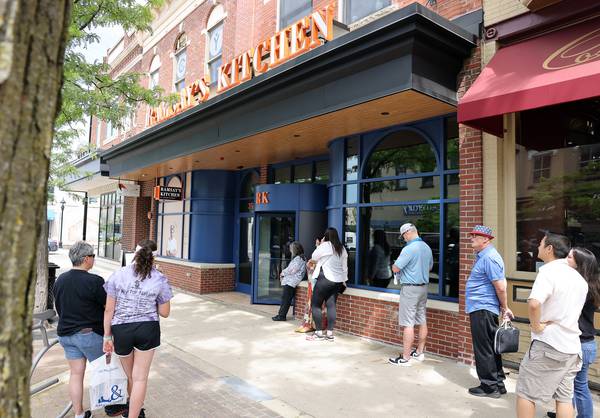 People line up outside Ramsay’s Kitchen in downtown Naperville on its opening day in May. The third in a chain operated by celebrity chef Gordon Ramsay, it's places like this that make the city a dining destination, with restaurant and bar sales of $504 million in 2022.