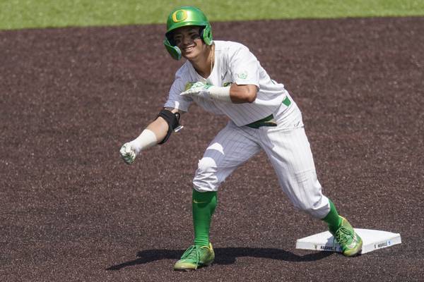 Oregon player Rikuu Nishida celebrates his double on June 2, 2023, in Nashville, Tenn.