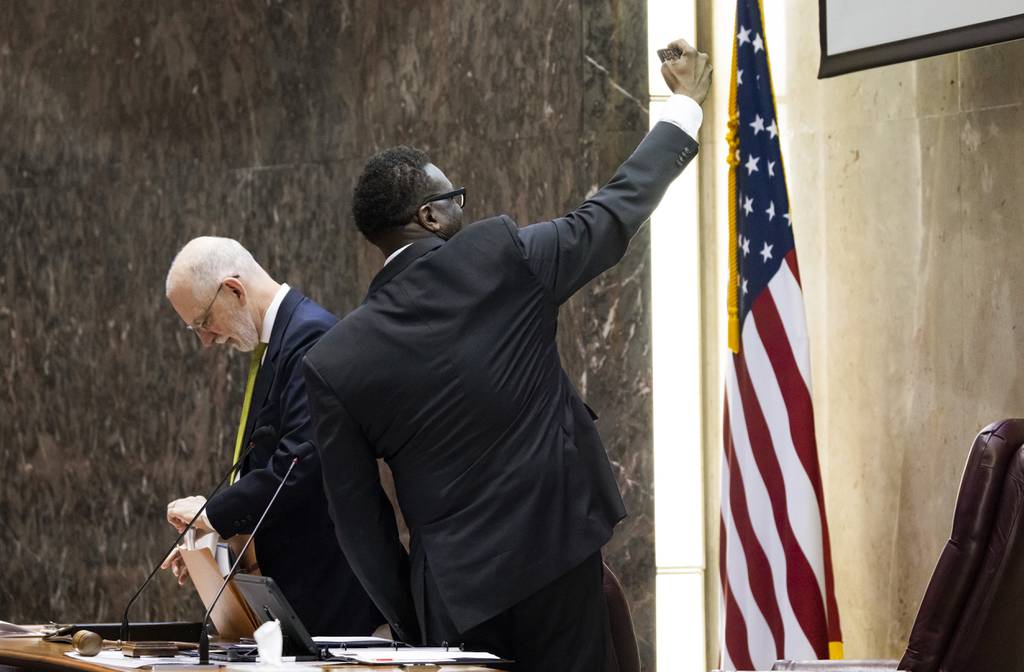 Mayor Brandon Johnson takes a selfie before a City Council meeting on May 24, 2023.