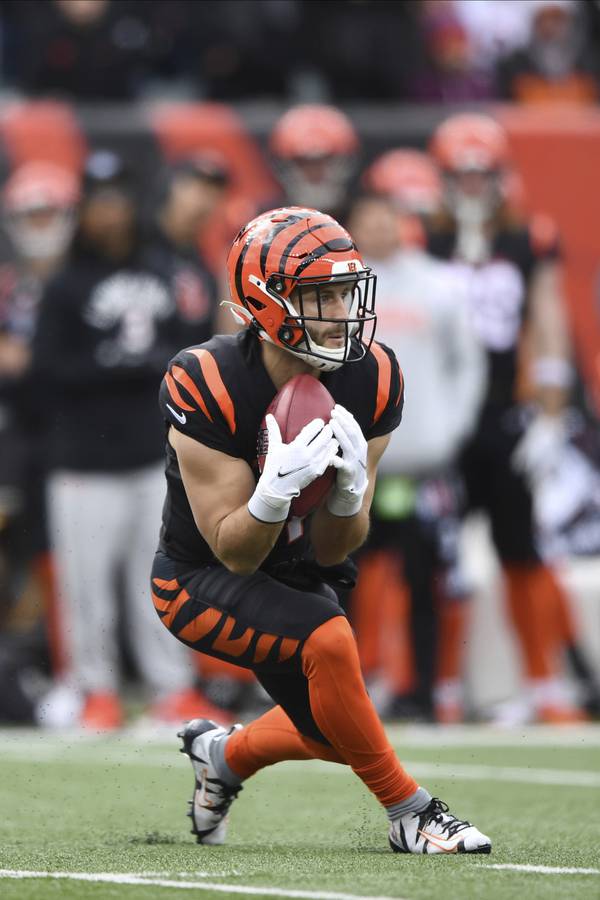 Bengals wide receiver Trent Taylor fields a punt against the Ravens on Jan. 8, 2023, in Cincinnati.