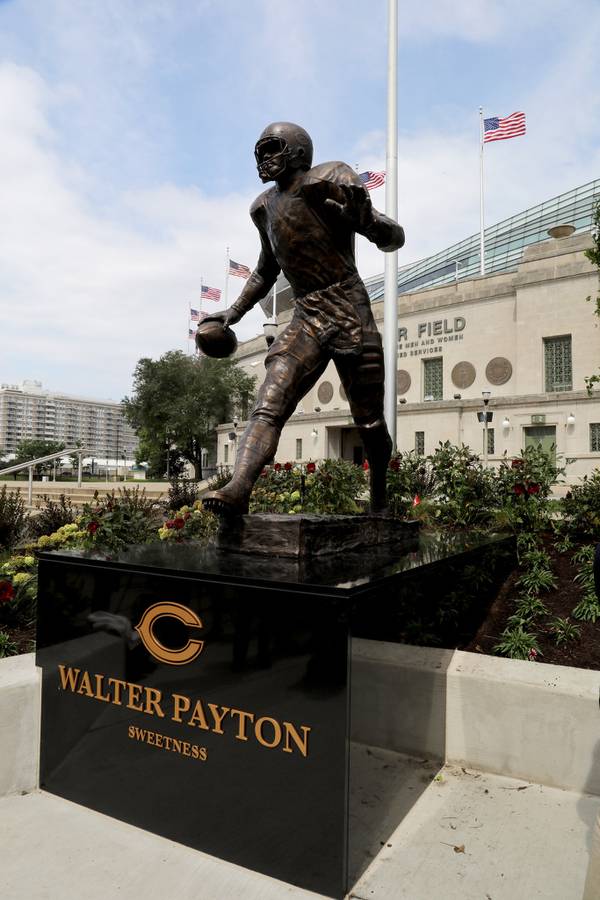 The Chicago Bears unveiled a 12-foot, 3,000-pound bronze statue of Hall of Famer Walter Payton outside Soldier Field on Sept. 3, 2019.
