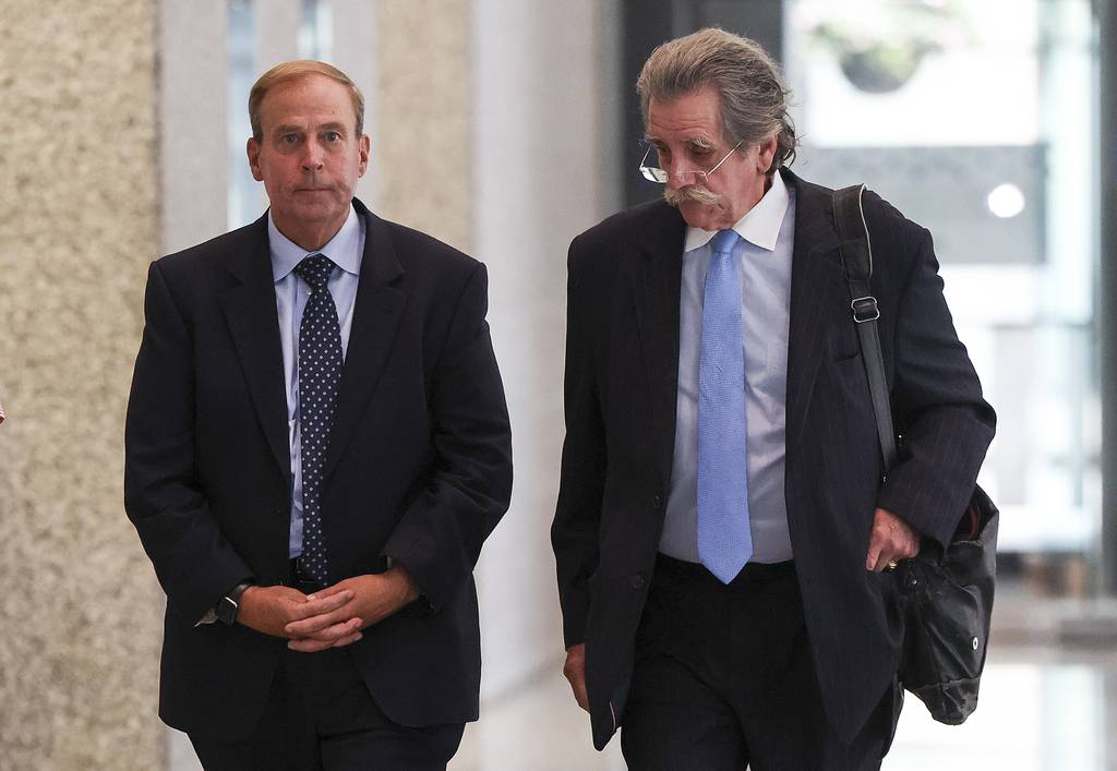Witness Tom Cullen, left, leaves the Dirksen U.S. Courthouse with his attorney, Thomas Anthony Durkin, on Aug. 9, 2023. 