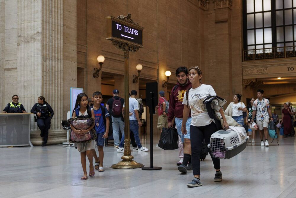The Mendez family walks through Union Station for the first time after riding a train for 18 hours from Denver to Chicago on July 15, 2023, in Chicago. The family left Venezuela for Chicago on May 25 and traveled for 52 days before reaching the city. 