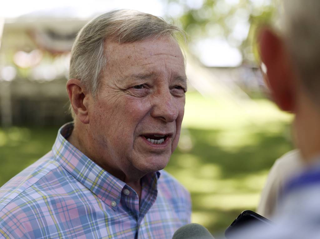 U.S. Sen. Dick Durbin speaks with reporters during Governor's Day at the Illinois State Fair on Aug. 16, 2023.