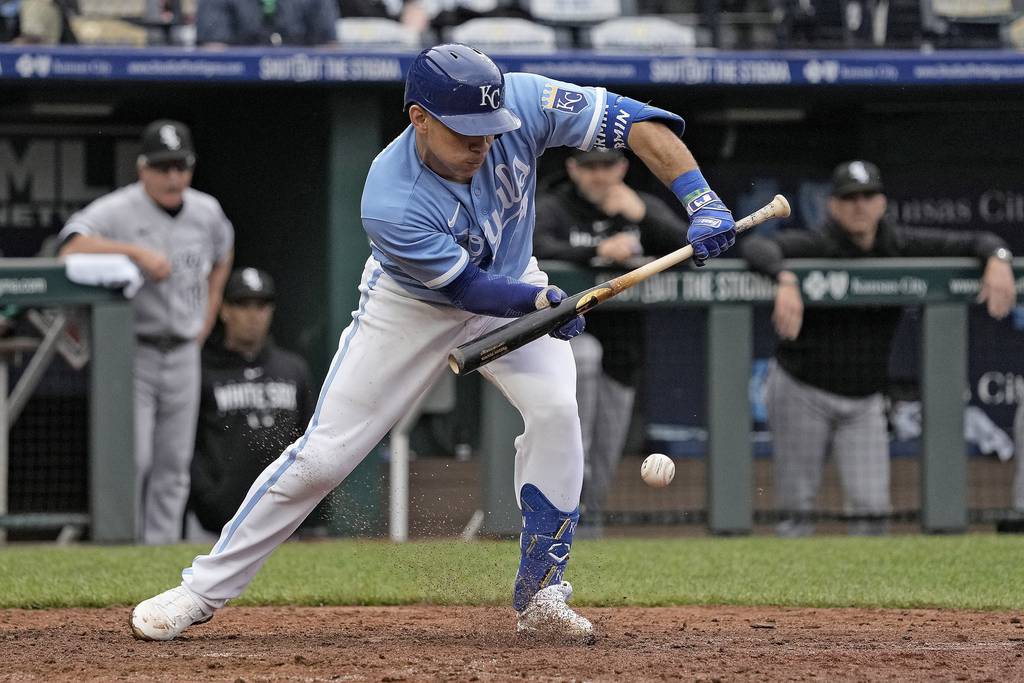The Royals' Freddy Fermin hits a bunt single to bring in the winning run during the ninth inning against the White Sox on May 11 in Kansas City, Mo. The Royals won 4-3. 