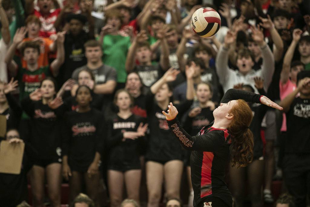 Marist's Maddie Berry (3) serves against Mother McAuley during a nonconference match in Chicago on Thursday, Sept. 22, 2022.