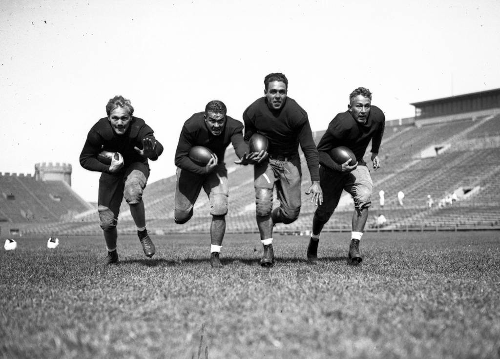 Ewald Nyquist, from left, Ned Bartlett, Warren Skoning and Jay Berwanger of the University of Chicago football team, circa 1936.