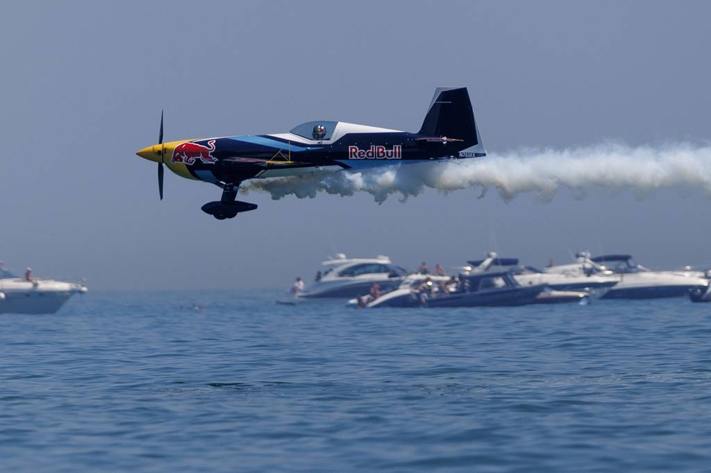 A plane flys over Lake Michigan during the Chicago Air and Water Show near North Avenue Beach in Chicago on Aug. 20, 2023.