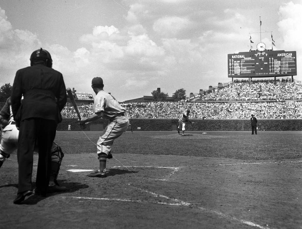 Chicago Cub Lon Warneke pitches against New York on July 12, 1942, at Wrigley Field. Warneke gave New York five runs. 