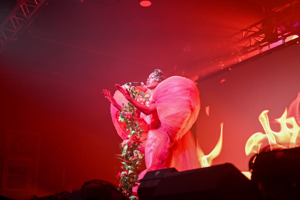 Shea Couleé performing live on stage at Concord Music Hall