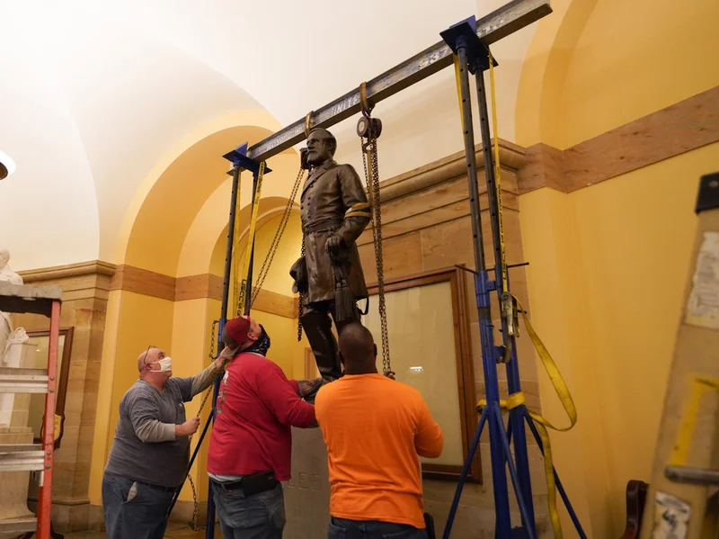 Statue of Robert E. Lee being removed from the U.S. Capitol in December 2020. Photo: Jack Mayer/Office of Governor Northam