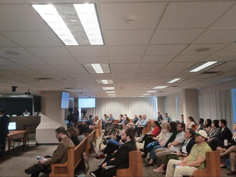 A crowd of domestic violence advocates and MPD staff attend the Minneapolis Audit Committee meeting to hear the long-delayed report.