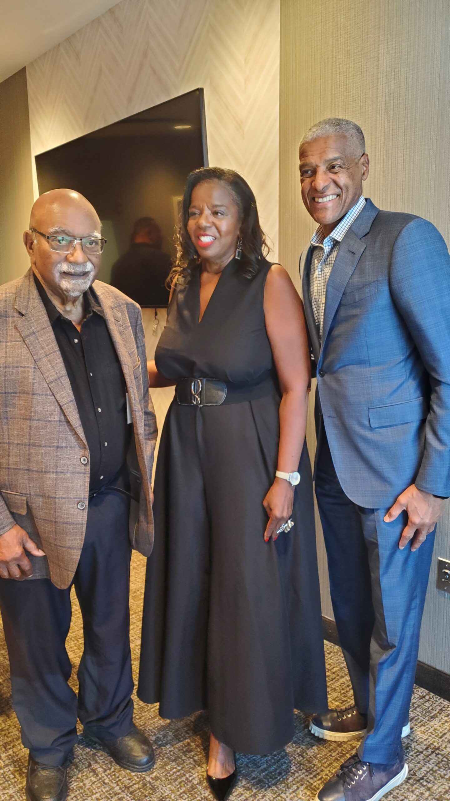 At SpringHill Suites by Marriott Oakland Airport, Post News Group Publisher Paul Cobb, OAACC President Cathy Adams, and Loop Capital President James