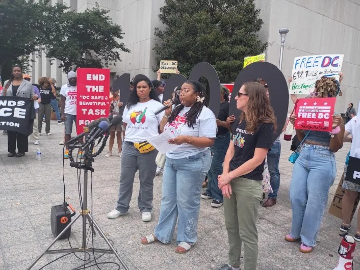Frankie Seabron, program manager for Harriet’s Wildest Dreams, is among those who spoke at the Aug. 3 rally in front of D.C. Superior Court. (Sam Plo Kwia Collins Jr./The Washington Informer)