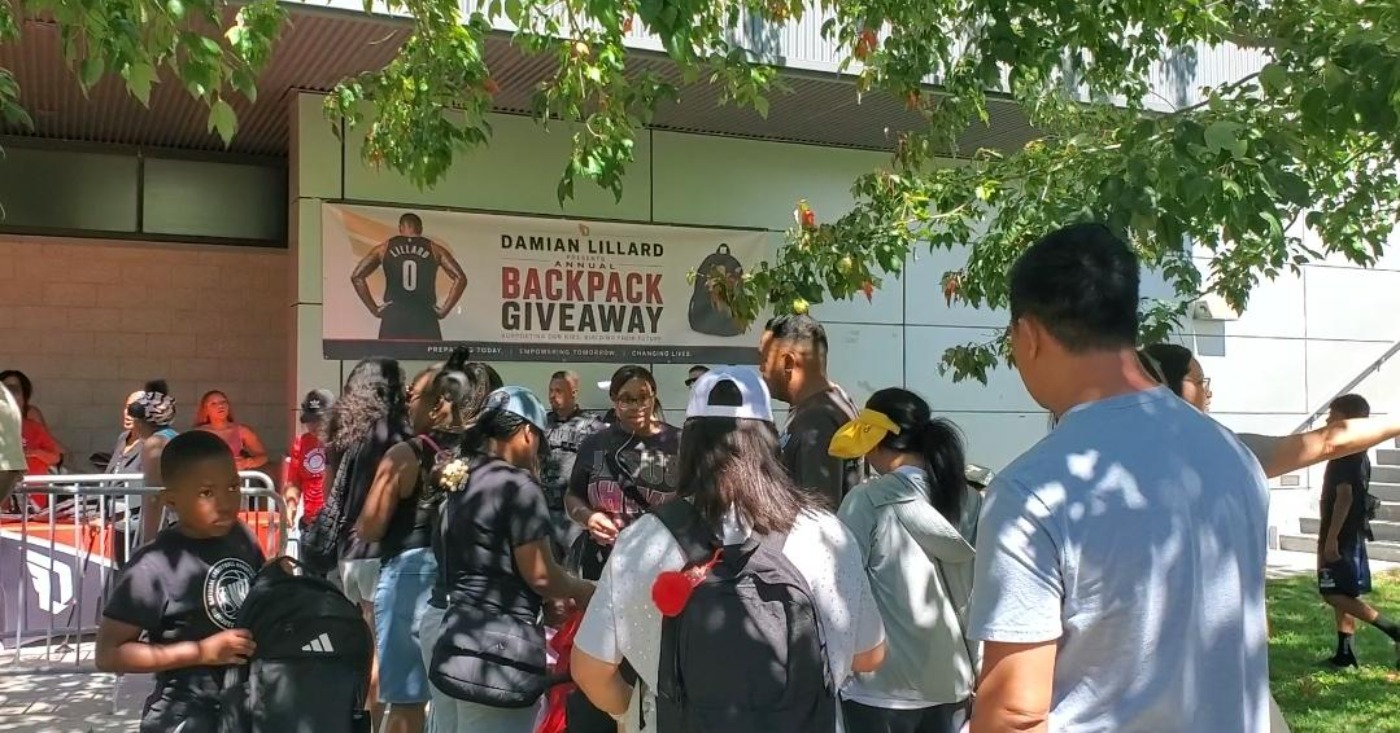 Portland Trail Blazers point guard and Oakland High School alum Damian Lillard hosts back-to-school giveaway at Ira Jinkins Recreation Center in East Oakland. Photo by Carla Thomas.